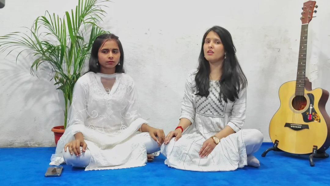 Two vocal students singing